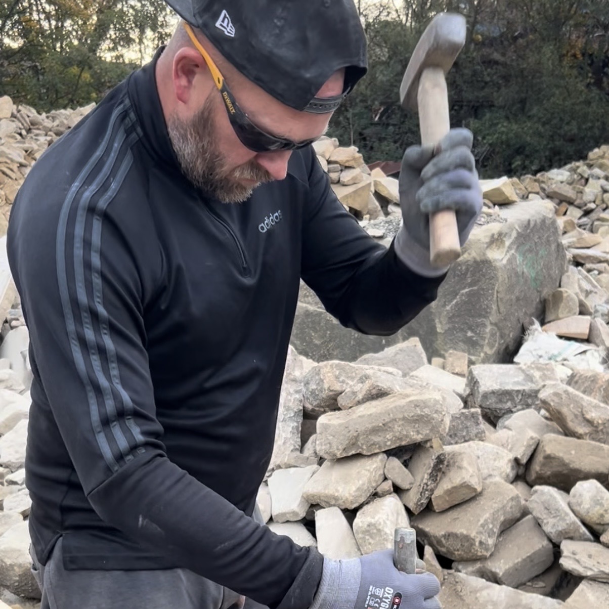 Adam Smith dressing stone by hand